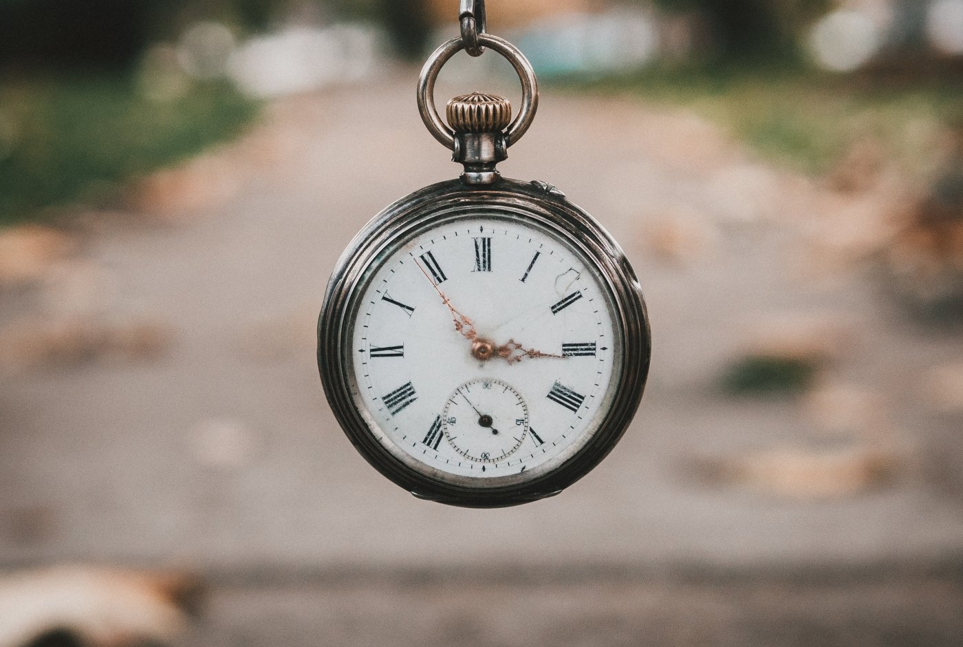 A watch hanging in the air