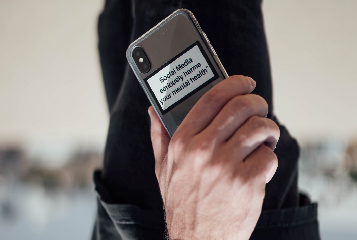 a man with a smartphone in his hand