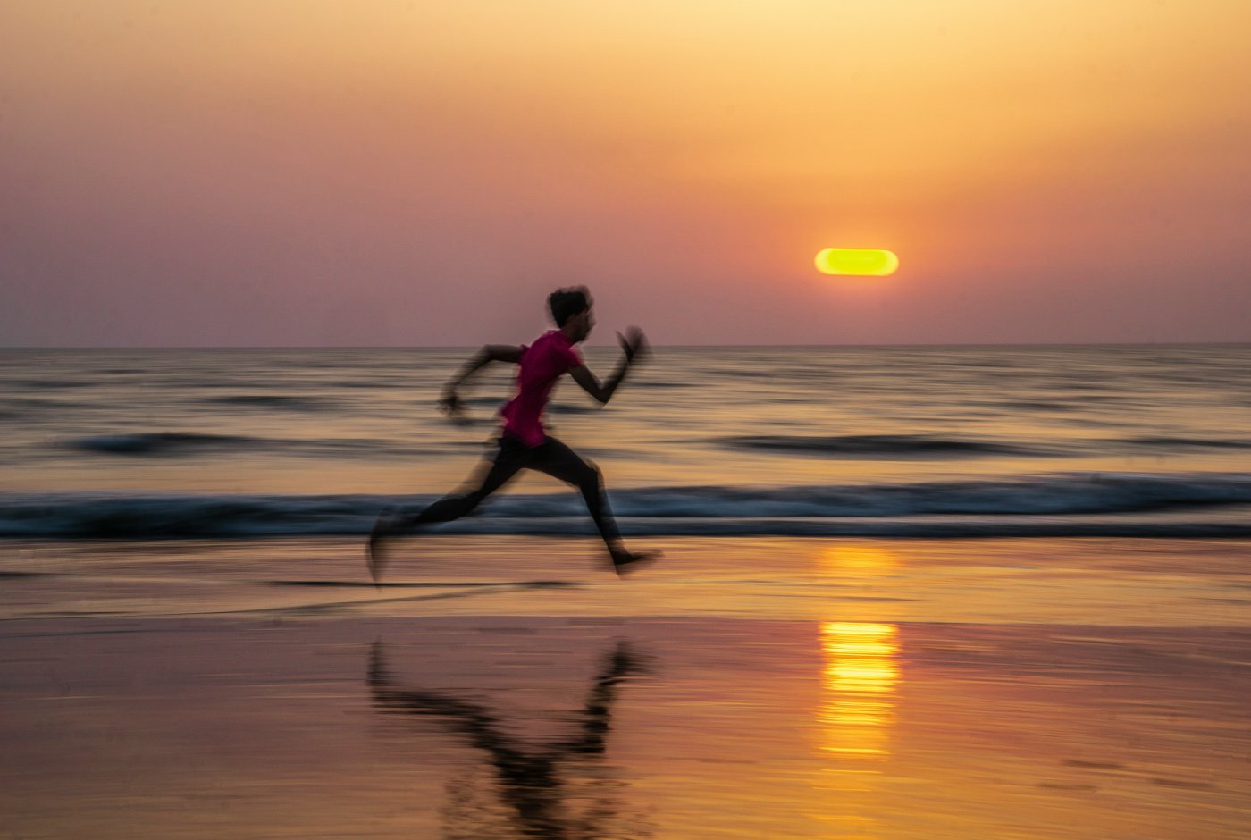 man running on beach