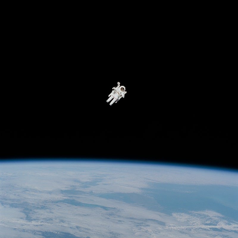 An astronaut and Earth