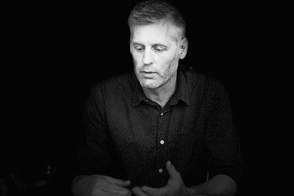 A black and white image of Tue Hassenkam