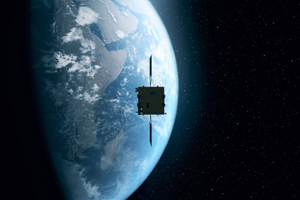 an image of Earth with a satellite in front of it