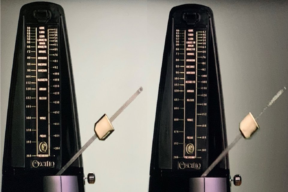 two metronomes in synchronicity