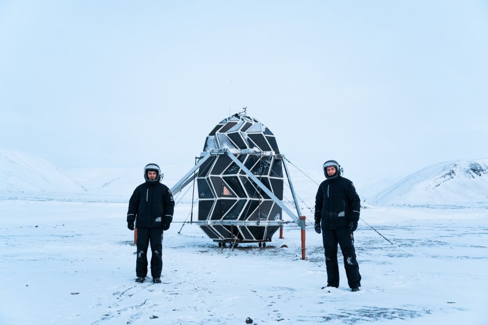 two men in Greenland testing a moon habitat