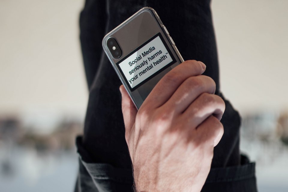 a man with a smartphone in his hand